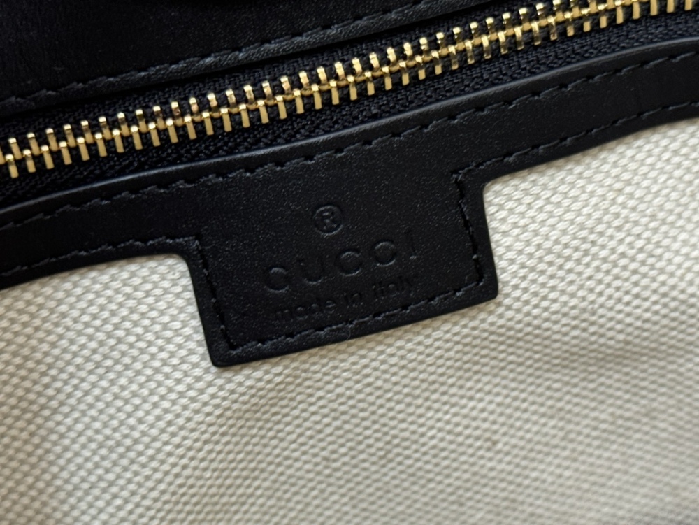 Horse carrying buckle crossbody bag