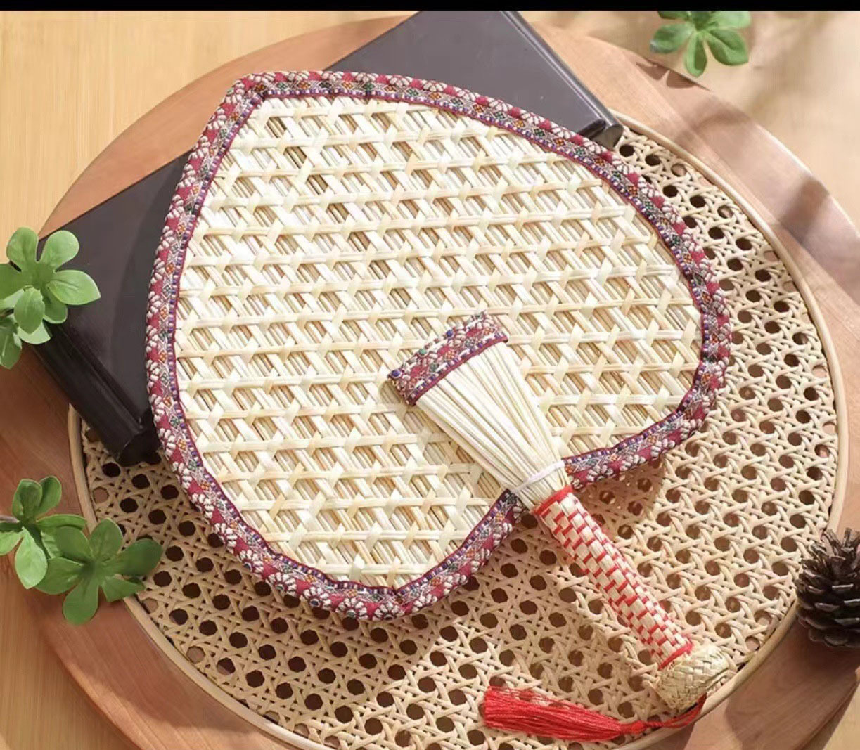 Beat the Heat in Style with Our Handwoven Raffia Fan – A Blend of Tradition and Comfort!