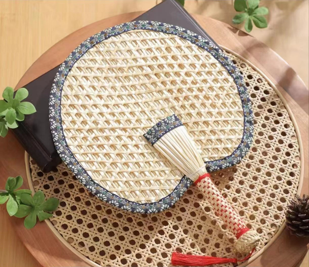 Beat the Heat in Style with Our Handwoven Raffia Fan – A Blend of Tradition and Comfort!