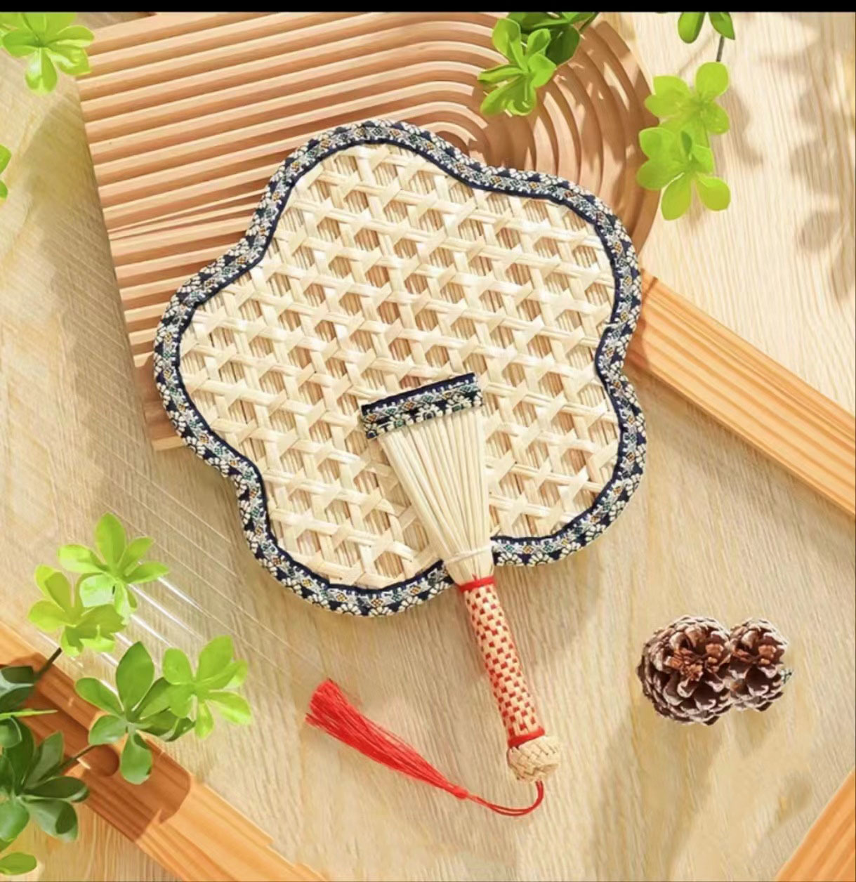 Beat the Heat in Style with Our Handwoven Raffia Fan – A Blend of Tradition and Comfort!