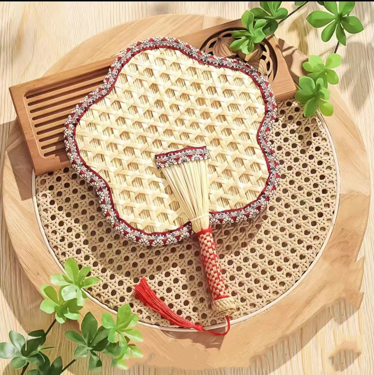 Beat the Heat in Style with Our Handwoven Raffia Fan – A Blend of Tradition and Comfort!