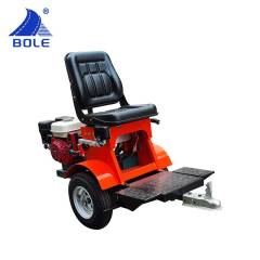 Front view of the Road Marking Machine With Booster showing control panel and driving seat


