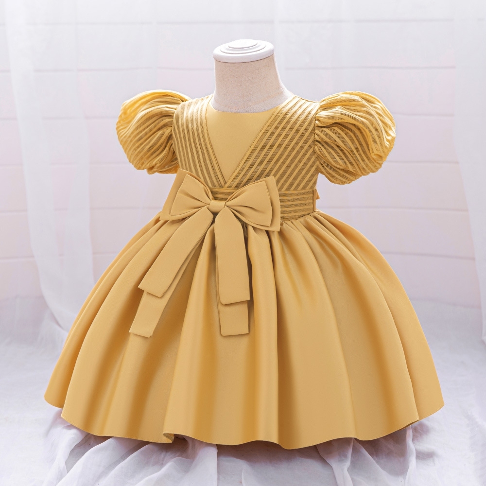 Enchanting Pastel Children's Dresses with Puff Sleeves, Bow Accents & Delicate Details for Special Occasions