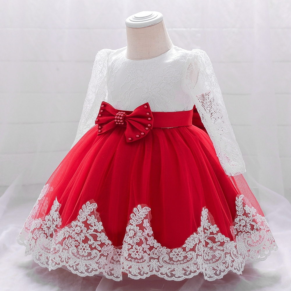 Elegant Girl's Dress: A Perfect Blend of Lace and Tulle" 英文介绍 This exquisite girl's dress combines delicate lace and fluffy tulle. With a charming white lace - covered top and a vibrant red tulle skirt, adorned with a large bow, it's ideal for special oc