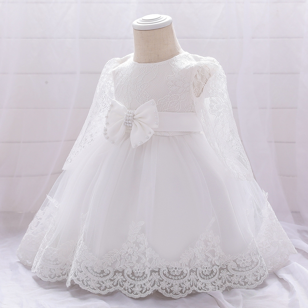 Elegant Girl's Dress: A Perfect Blend of Lace and Tulle" 英文介绍 This exquisite girl's dress combines delicate lace and fluffy tulle. With a charming white lace - covered top and a vibrant red tulle skirt, adorned with a large bow, it's ideal for special oc