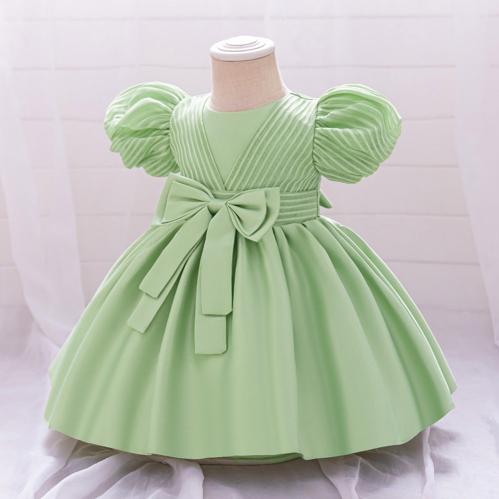 Enchanting Pastel Children's Dresses with Puff Sleeves, Bow Accents & Delicate Details for Special Occasions