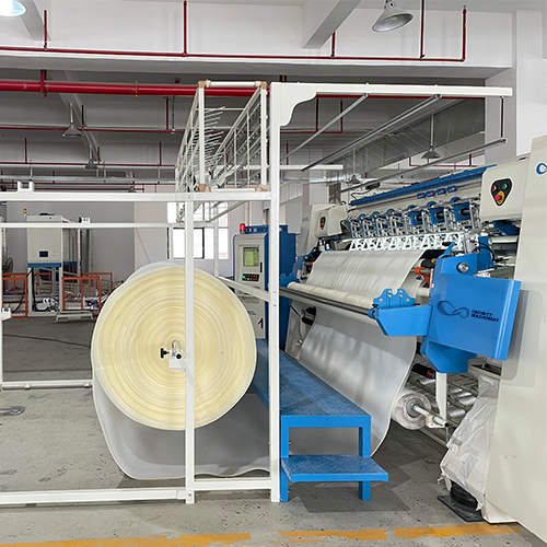 IF-Q-1200 quilting a mattress panel in production