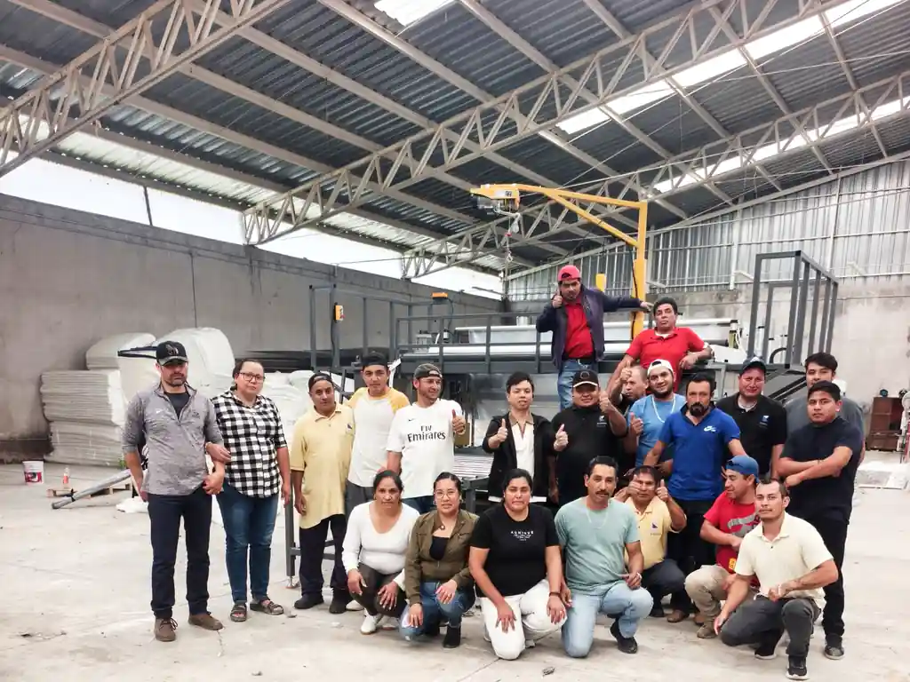 Infinity technician and the client's factory team in Mexico