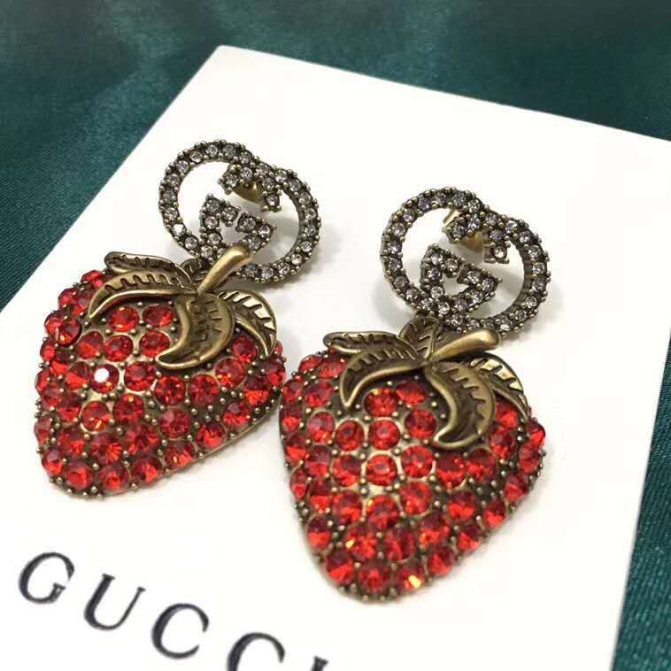 Gucci Earrings with strawberry pendant