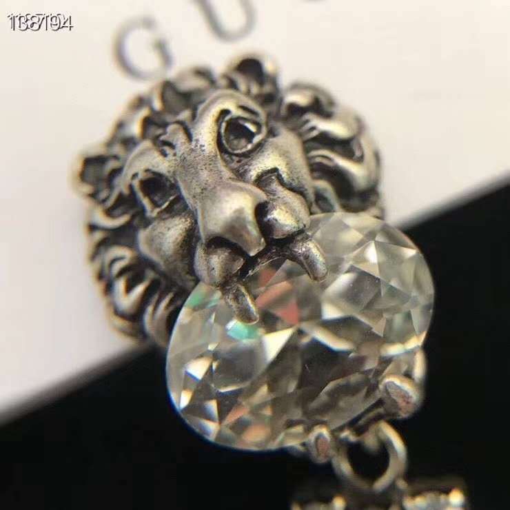 Gucci aged  Lion head asymmetric earrings cascade crystal fringes