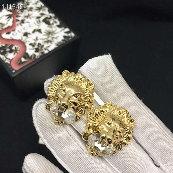 Gucci shiny gold finish Lion head earrings with crystal in mouth Pierced