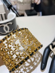 Chanel Replica Cuff Bracelet Black Leather Trim Hollowing Flower Crystal Metal Wide Top Best Quality