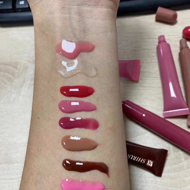 Private Label Hot Selling Peptide Lip Tint Hydrating Nourishing Non-Sticky Lip Gloss Lip Balm with Phone Case