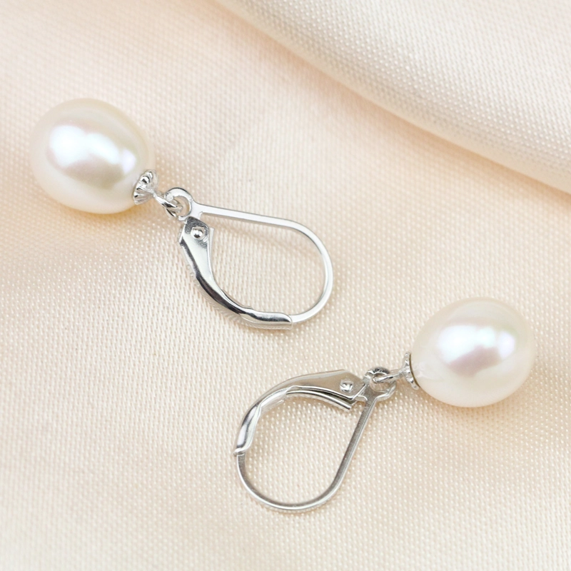 white pearl earrings