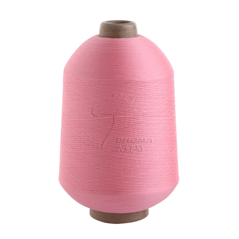 Pink polyester stretch yarn cone