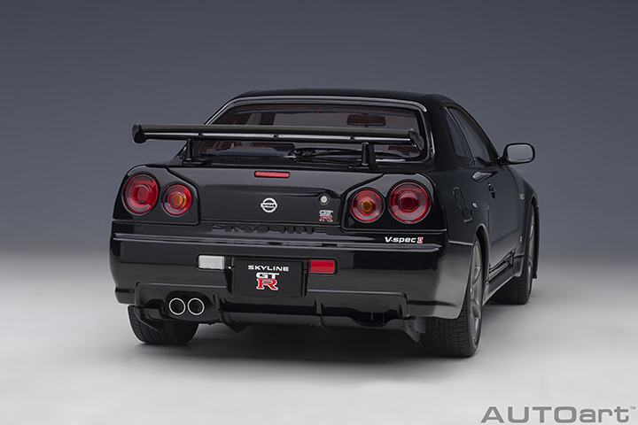 77407 1/18 NISSAN SKYLINE GT-R (R34) V-SPEC II (BLACK PEARL)