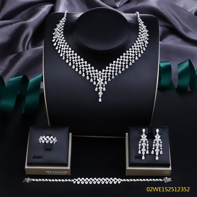 Blossom CS Jewelry V‑Neck Multi‑Tier Teardrop Cubic Zirconia 4 Pieces Bridal Jewelry Set Necklace Earrings Ring Bracelet For Wedding Formal Occasion