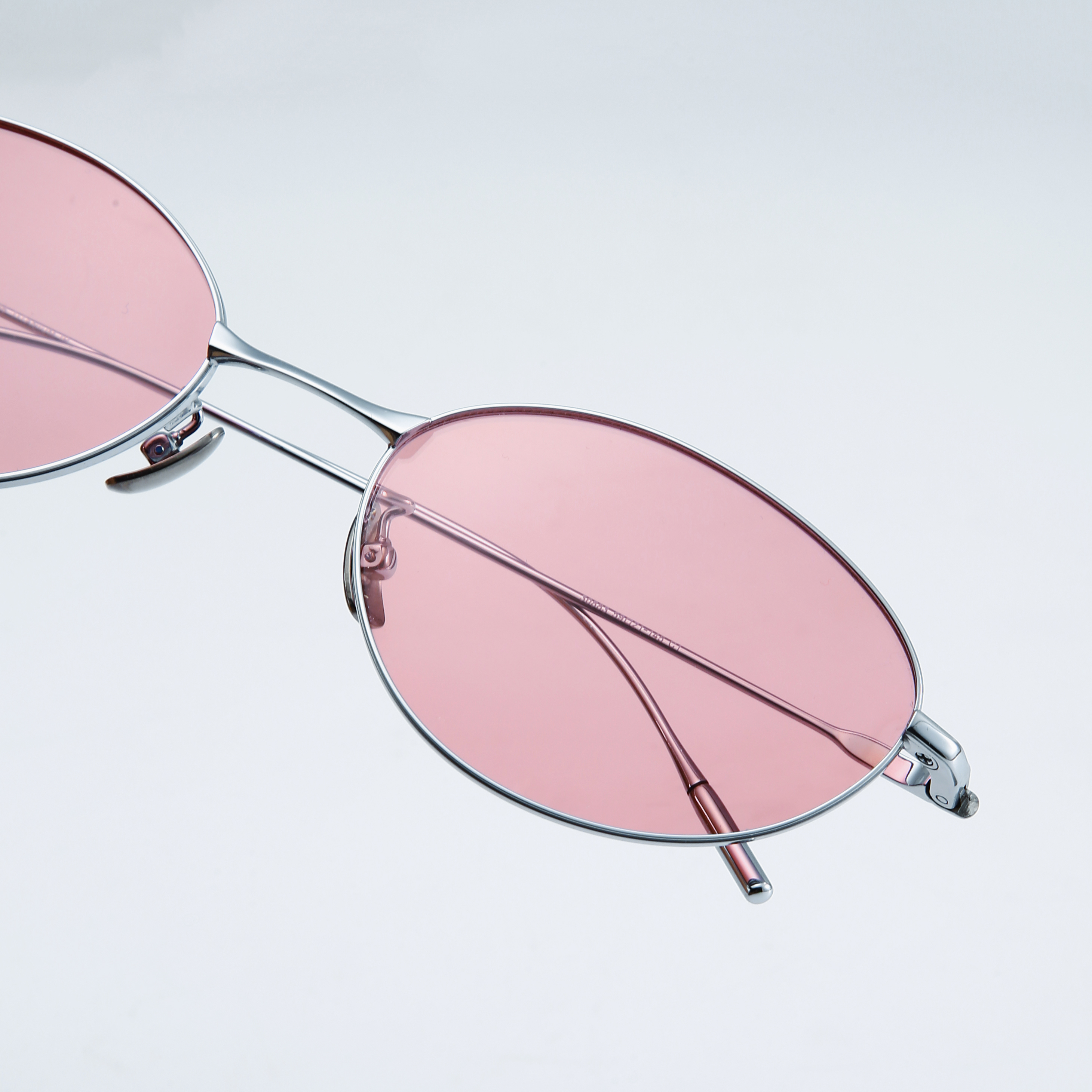 Cutom Beta Titanium Eyewear Manufacturer China Women's Petite Thin Oval Shades for Ladies Trendy Polarized Sunglasses Wholesale Online