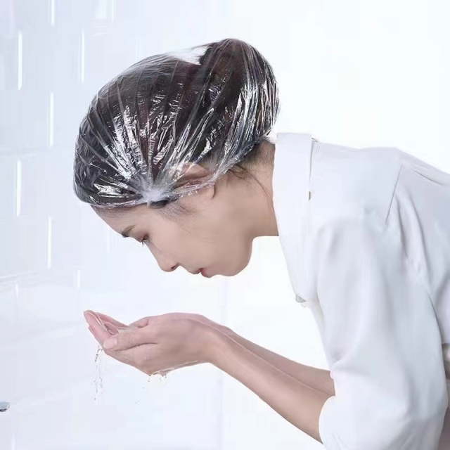 Environmental protection, deodorant, deodorant, dustproof, waterproof, oil -proof and anti -pollution, one -time new material thickened shower cap (东莞市超白化工贸易有限公司)