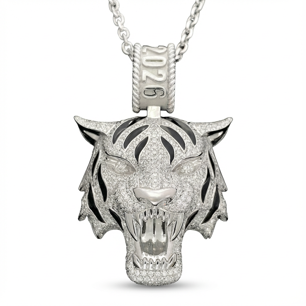 Lightweight 30g hollow-back roaring tiger pendant encrusted with brilliant zircons and black enamel stripes, featuring a custom 2026 commemorative bail