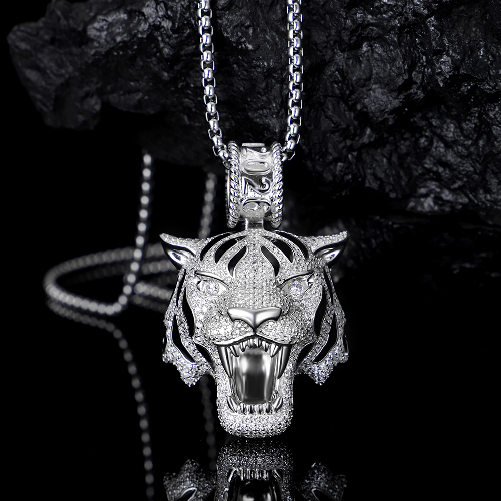 Close up of iced out 2026 roaring tiger pendant S925 silver.