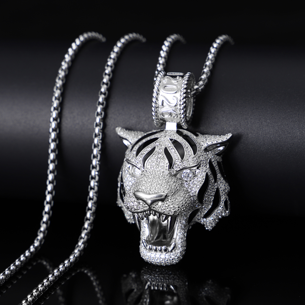 Close up of iced out 2026 roaring tiger pendant S925 silver.