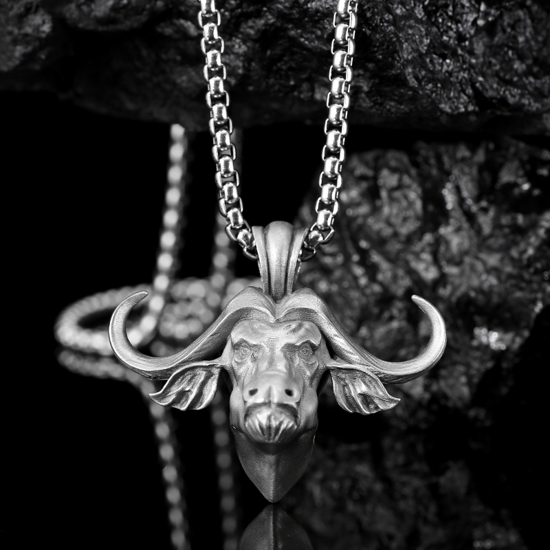 Rugged solid lead-free pewter pendant featuring a highly detailed 3D relief of a Cape Buffalo head with sweeping horns