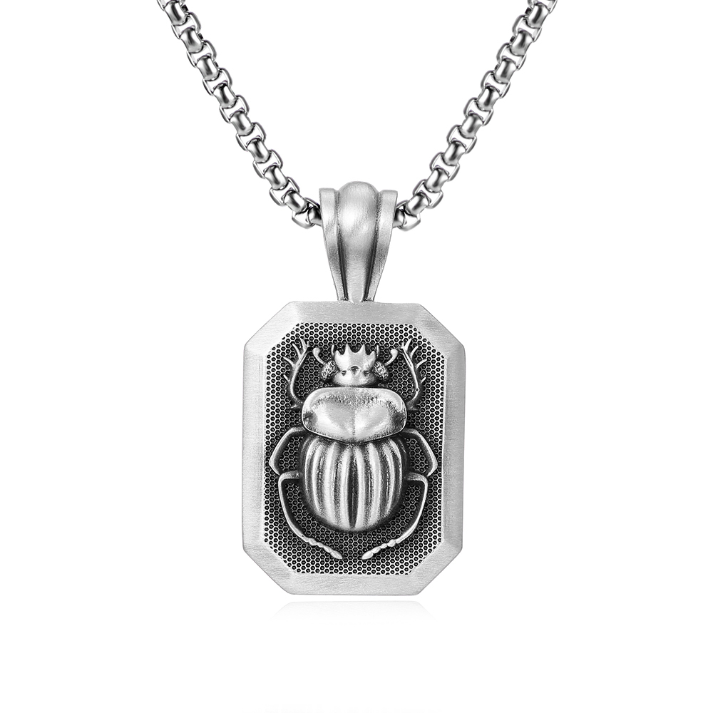 Solid lead-free pewter pendant featuring a 3D relief of an ancient Egyptian Scarab beetle set inside a rectangular frame with a textured background
