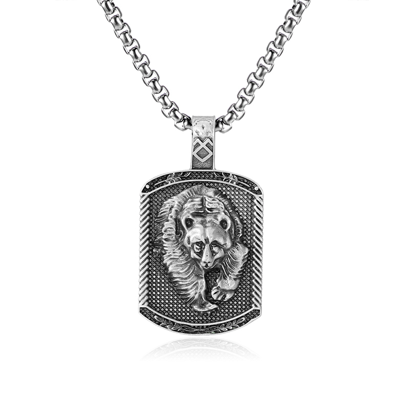 Rugged solid lead-free pewter dog tag pendant featuring a 3D relief of a charging grizzly bear with a runic symbol on the bail