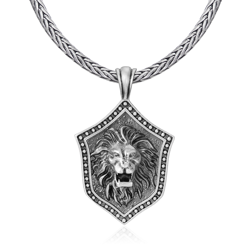 Solid lead-free pewter pendant featuring a 3D relief of a roaring lion head mounted on a medieval studded shield
