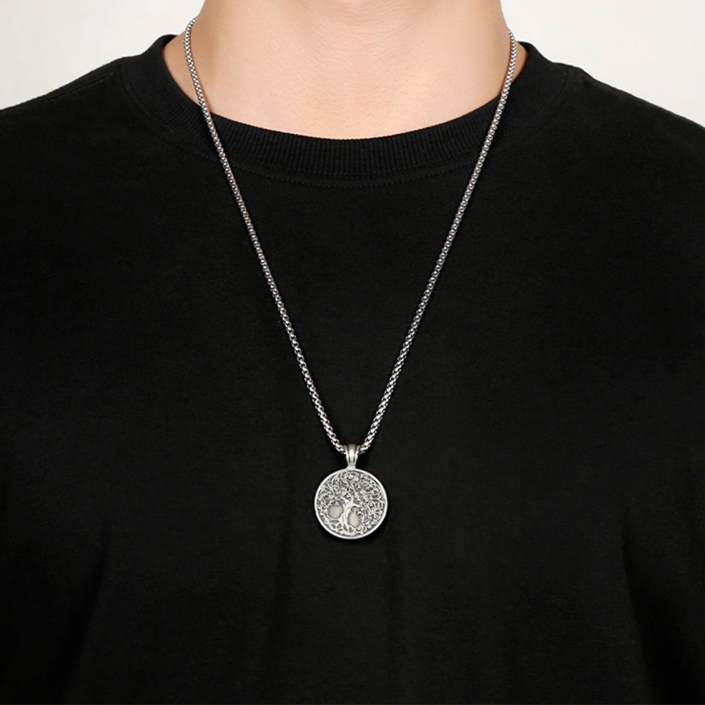 Solid lead-free pewter pendant featuring a highly detailed 3D relief of a Tree of Life with lush leaves and deep roots on a solid circular background