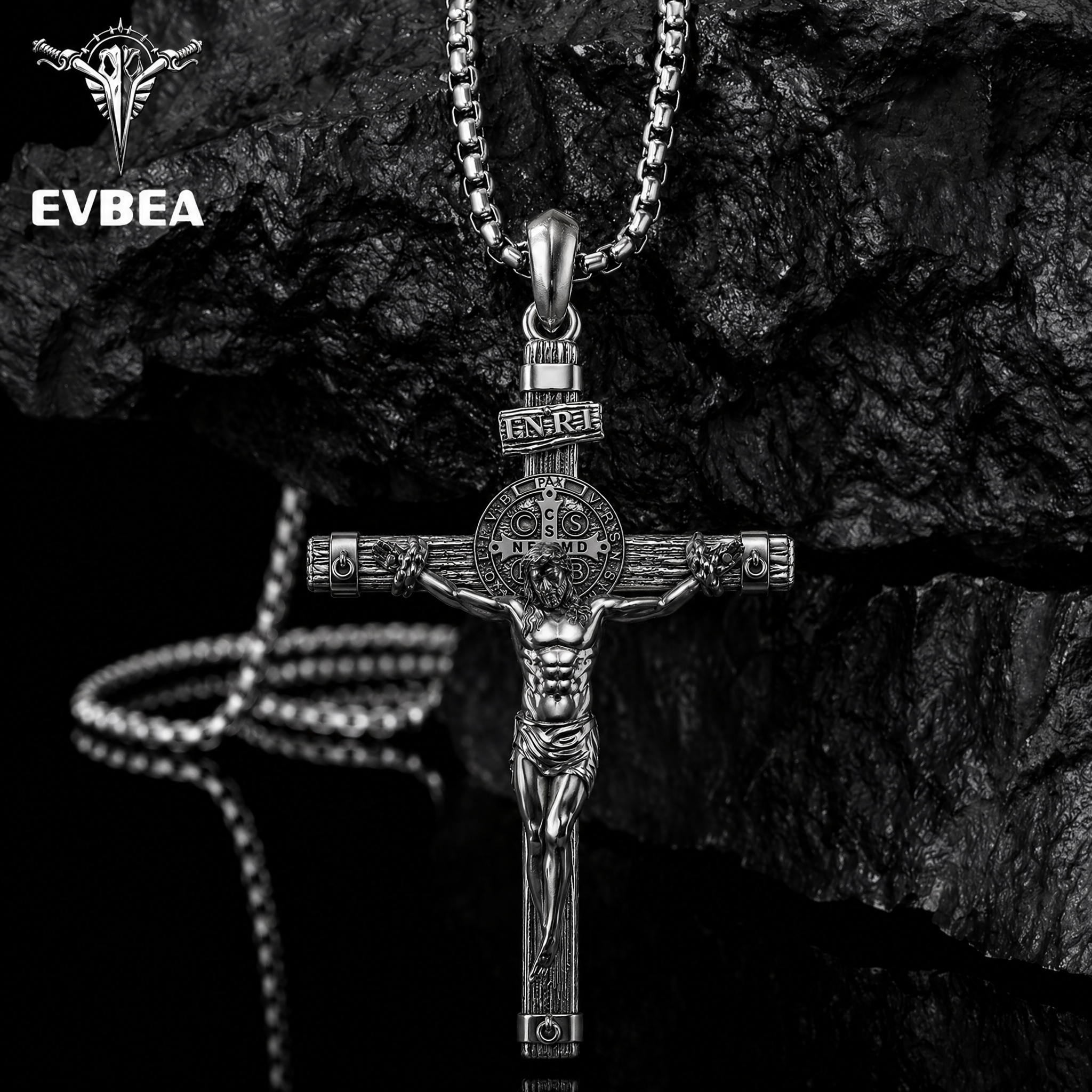 Solid lead-free pewter St. Benedict crucifix pendant featuring a detailed corpus, wood-grain cross texture, and the INRI plaque