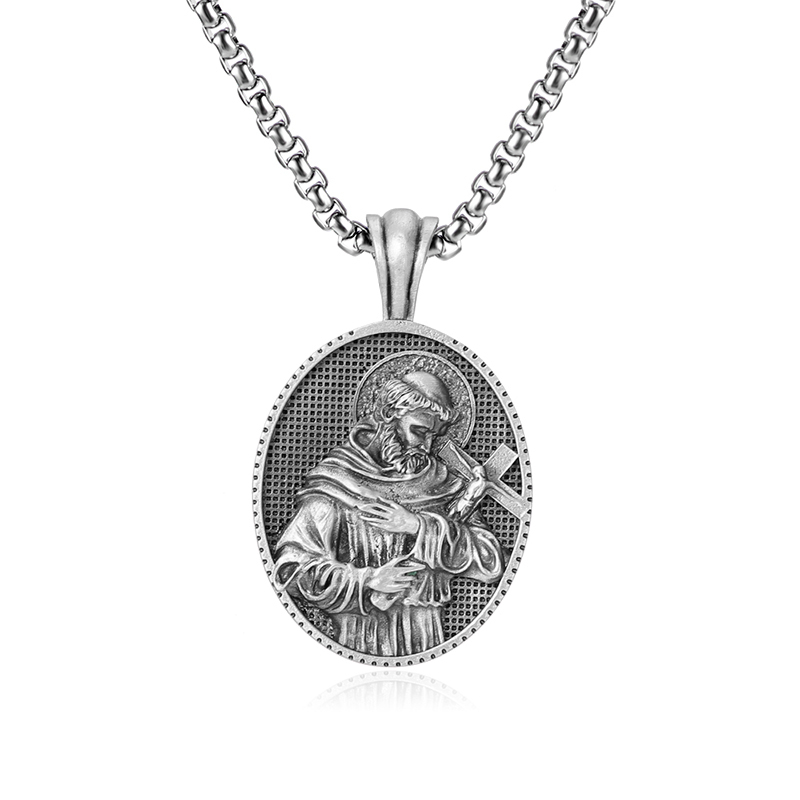 Solid lead-free pewter oval Catholic pendant featuring a 3D relief of Saint Francis of Assisi in a monk's habit holding a crucifix against a textured background