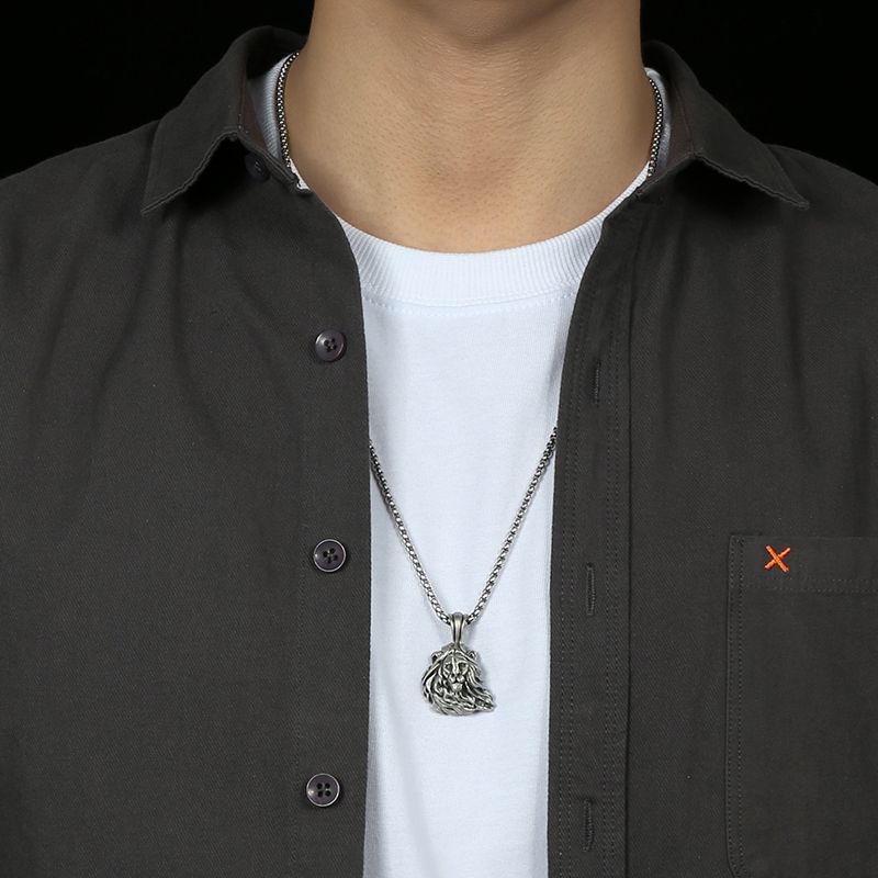 Model wearing EVBEA solid pewter lion head pendant necklace in vintage matte finish