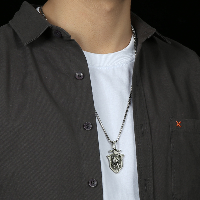 Model wearing EVBEA solid pewter Norse bear warrior shield pendant necklace