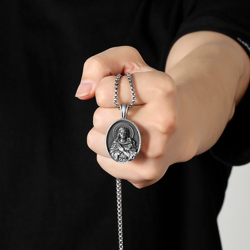 Model wearing EVBEA solid pewter Virgin Mary holy medal pendant necklace