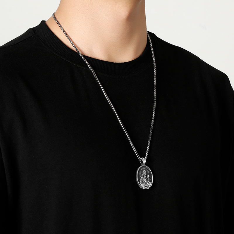Model wearing EVBEA solid pewter Virgin Mary holy medal pendant necklace
