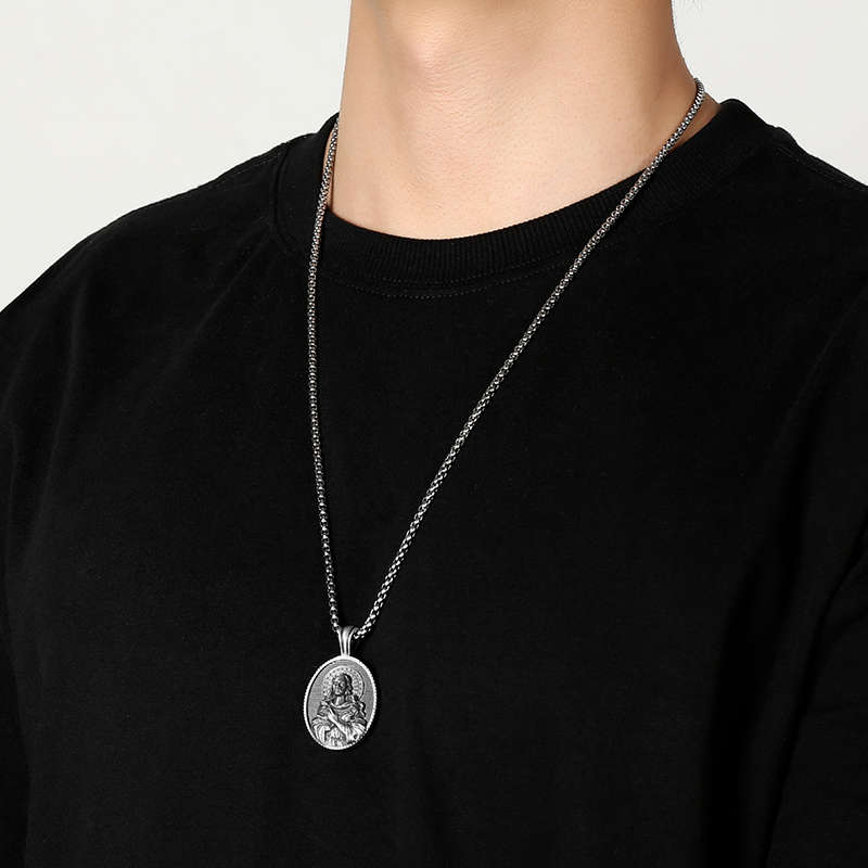 Model wearing EVBEA solid pewter Virgin Mary holy medal pendant necklace