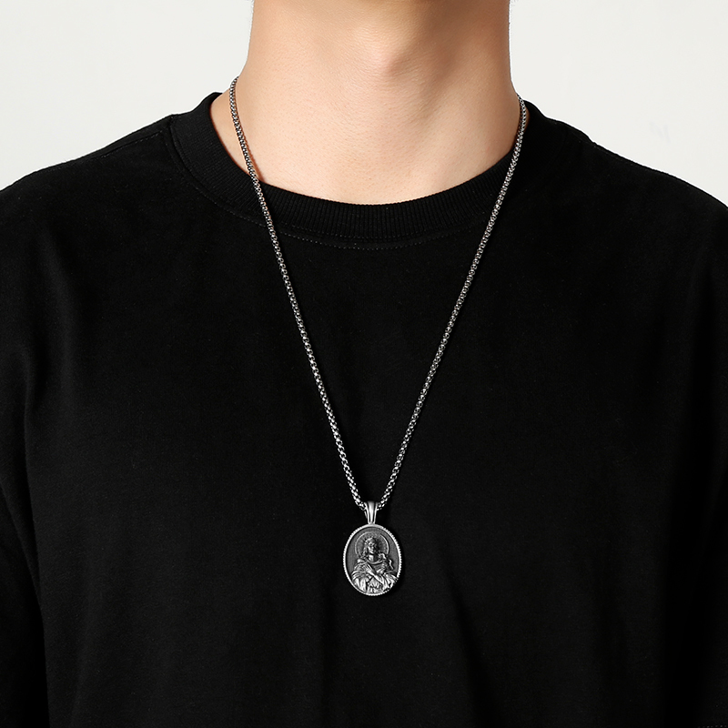 Model wearing EVBEA solid pewter Virgin Mary holy medal pendant necklace