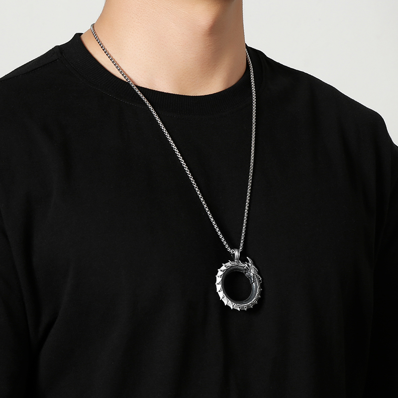 Model wearing EVBEA solid pewter Ouroboros infinity serpent pendant necklace
