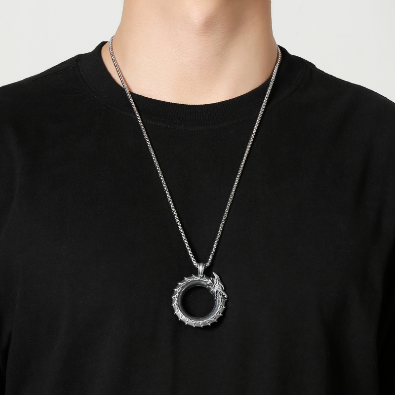 Model wearing EVBEA solid pewter Ouroboros infinity serpent pendant necklace