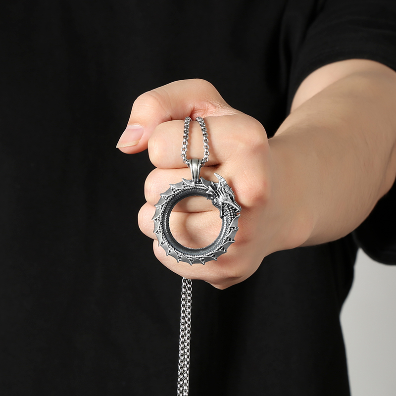 Model wearing EVBEA solid pewter Ouroboros infinity serpent pendant necklace