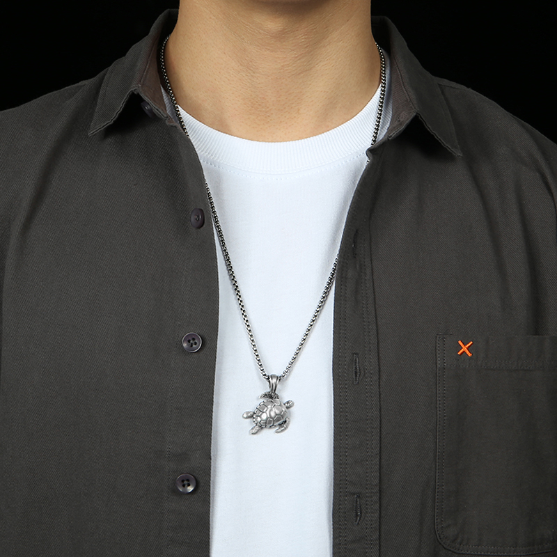 Model wearing EVBEA solid pewter sea turtle ocean totem pendant necklace