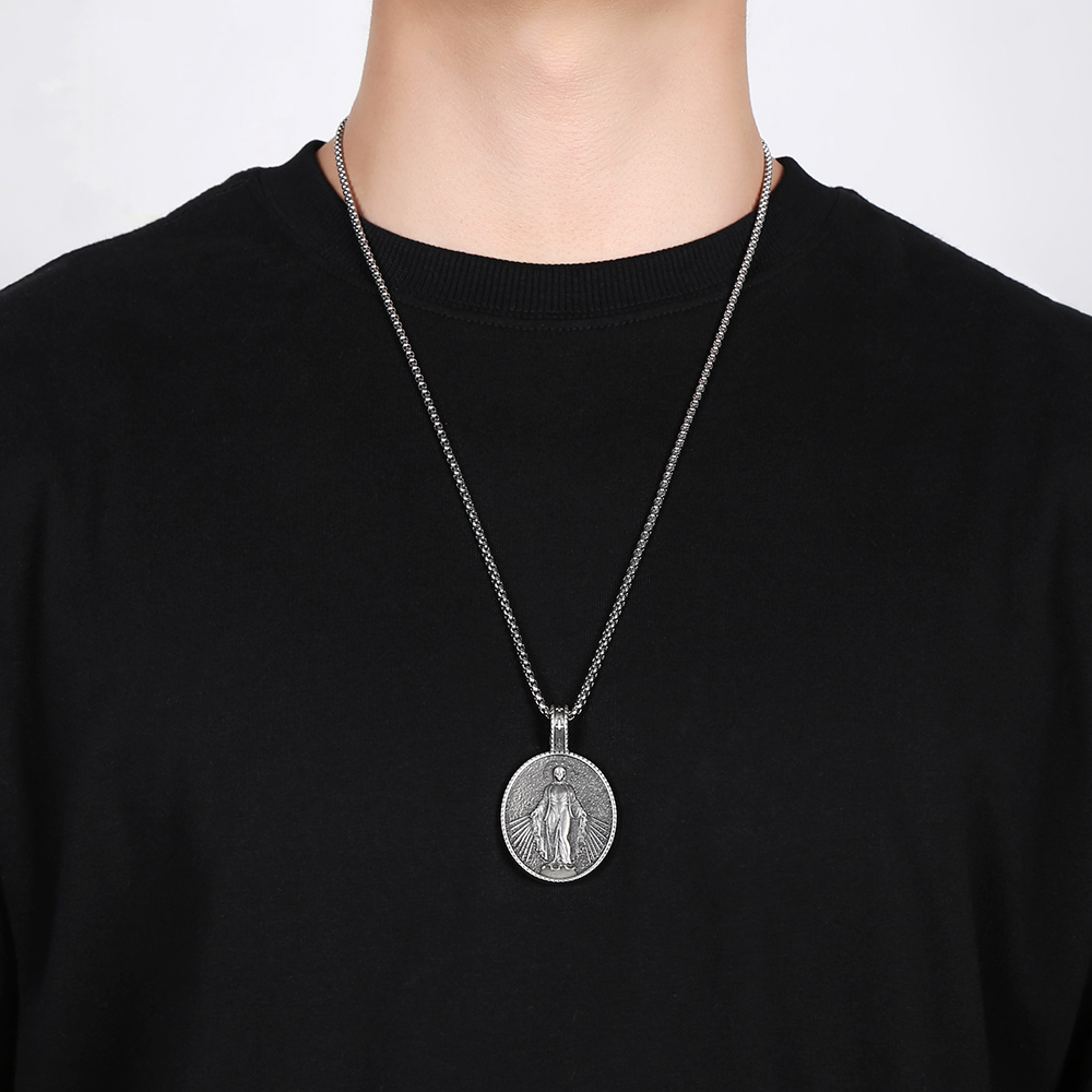 Model wearing EVBEA solid pewter Virgin Mary holy medal pendant necklace for men