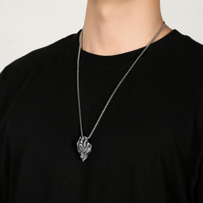 Model wearing EVBEA solid pewter mythical dragon head pendant necklace for men