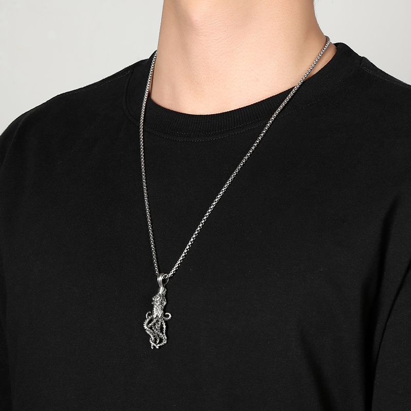 Model wearing EVBEA solid pewter Kraken octopus tentacle pendant necklace for men