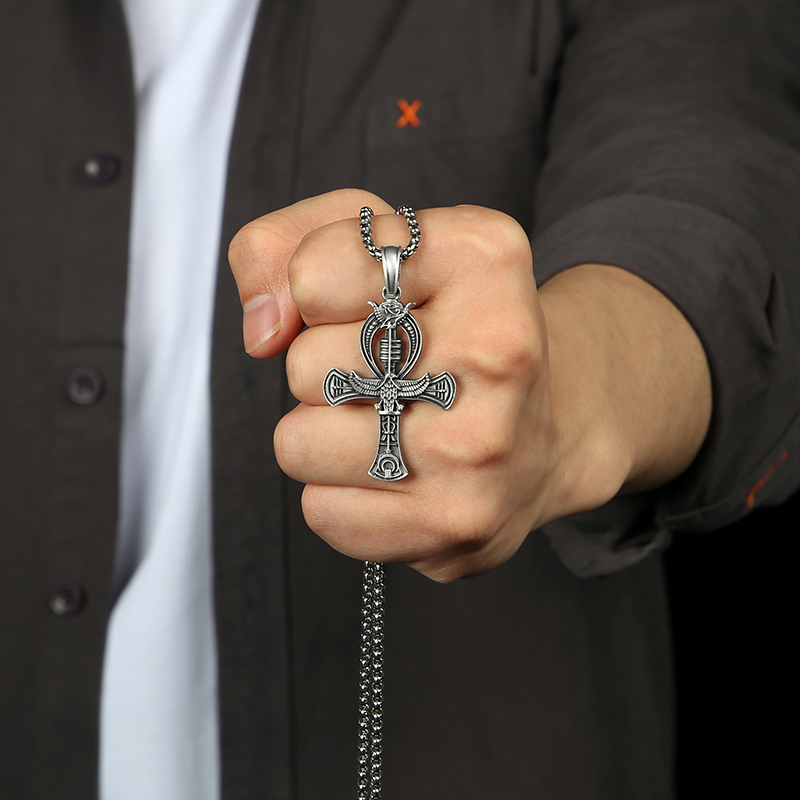 Close-up of hand-brushed solid pewter Ankh cross with winged Horus and Djed pillar with EVBEA stamp