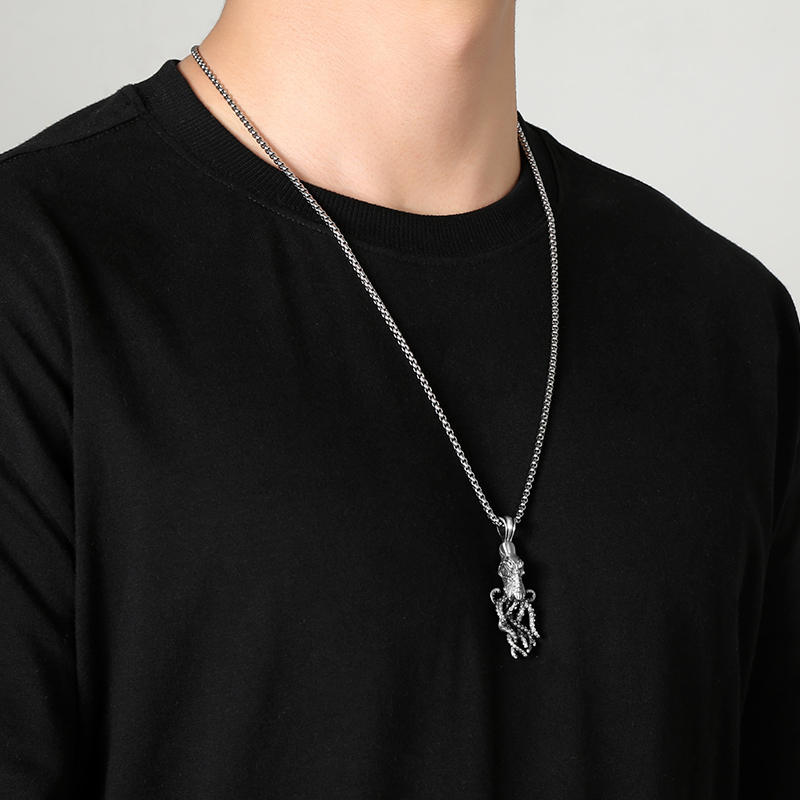 Model wearing EVBEA solid pewter Kraken octopus tentacle pendant necklace for men