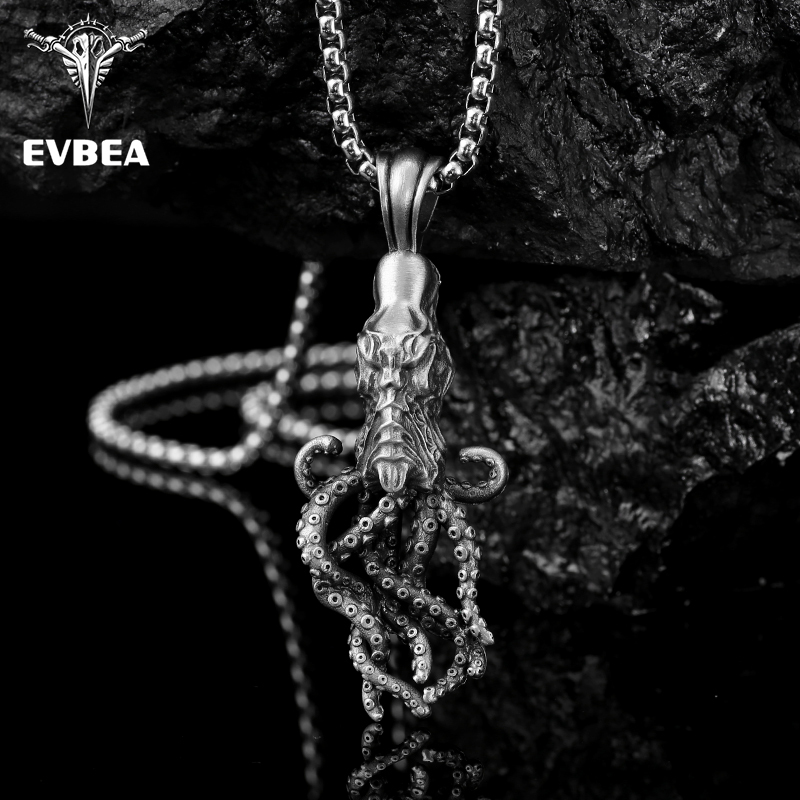 Close-up of hand-brushed solid pewter octopus tentacles and suction cups with EVBEA stamp