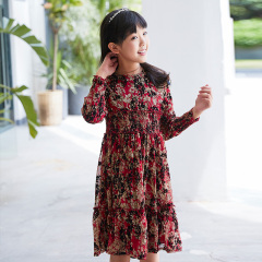 New children's dress with a red base and floral patterns, featuring a waist - cinching design and long sleeves, and retro prints.